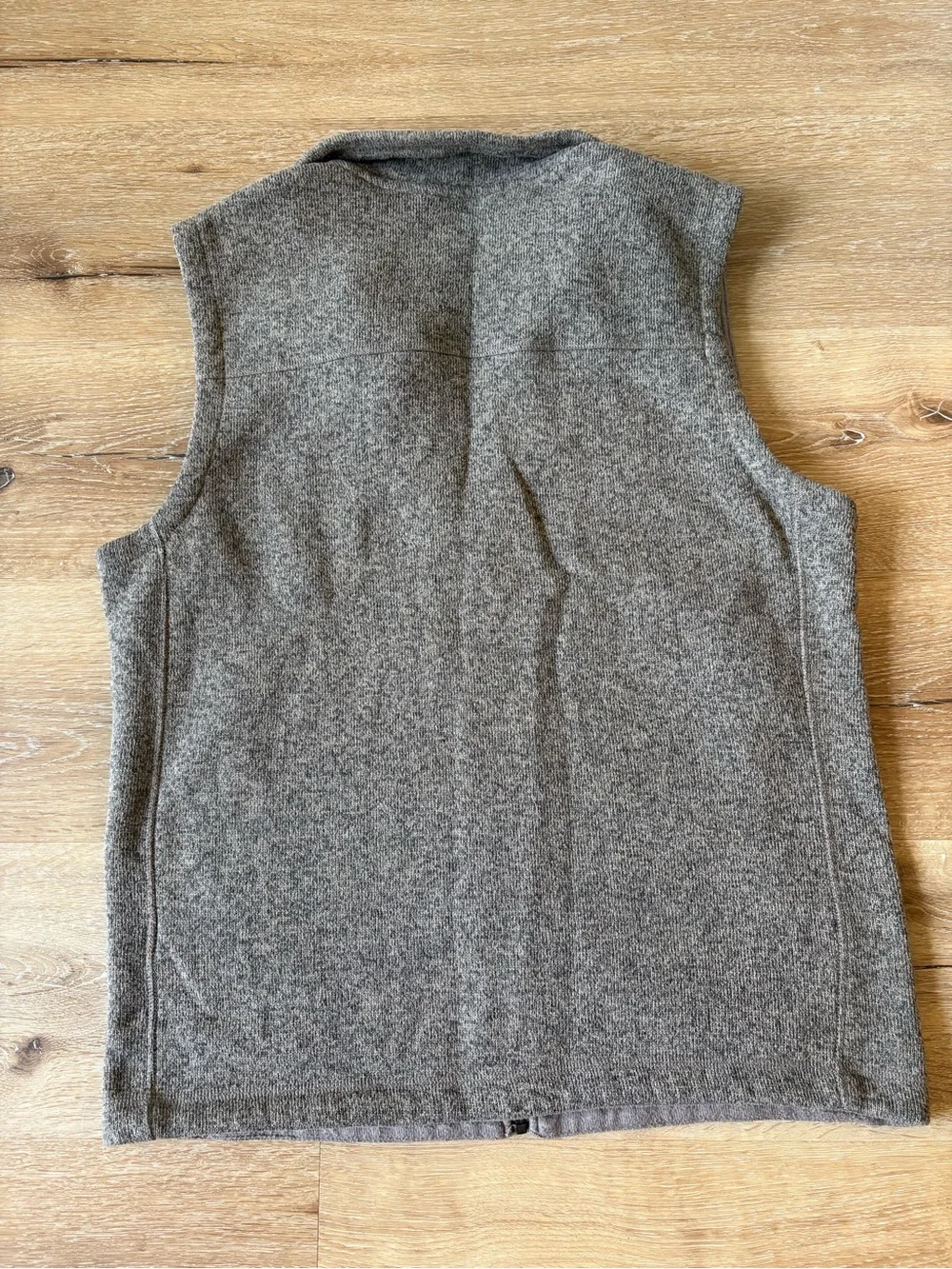 The North Face Men’s Brown Fleece Vest with zippered pockets
